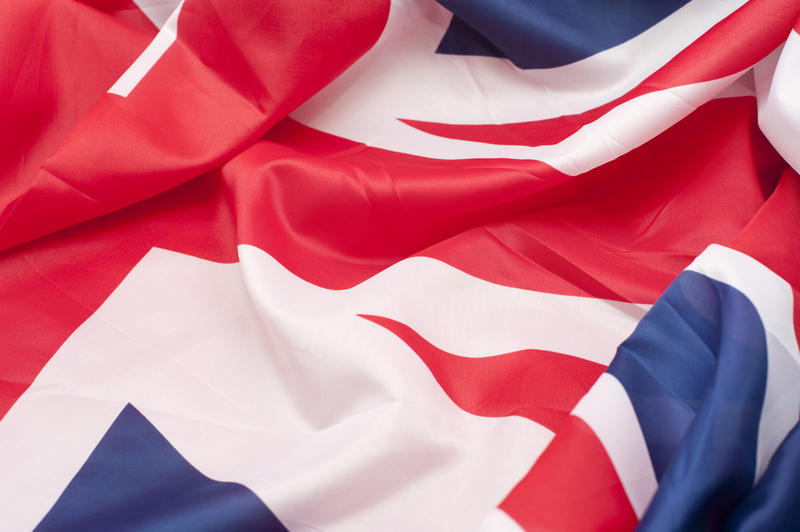 a rippled union flag background representing the united kingdom