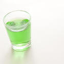 10425   Glass of green absinthe liqueur