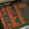 10672   Departures Check in board at an airport