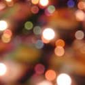 11560   Festive background bokeh of sparkling party lights