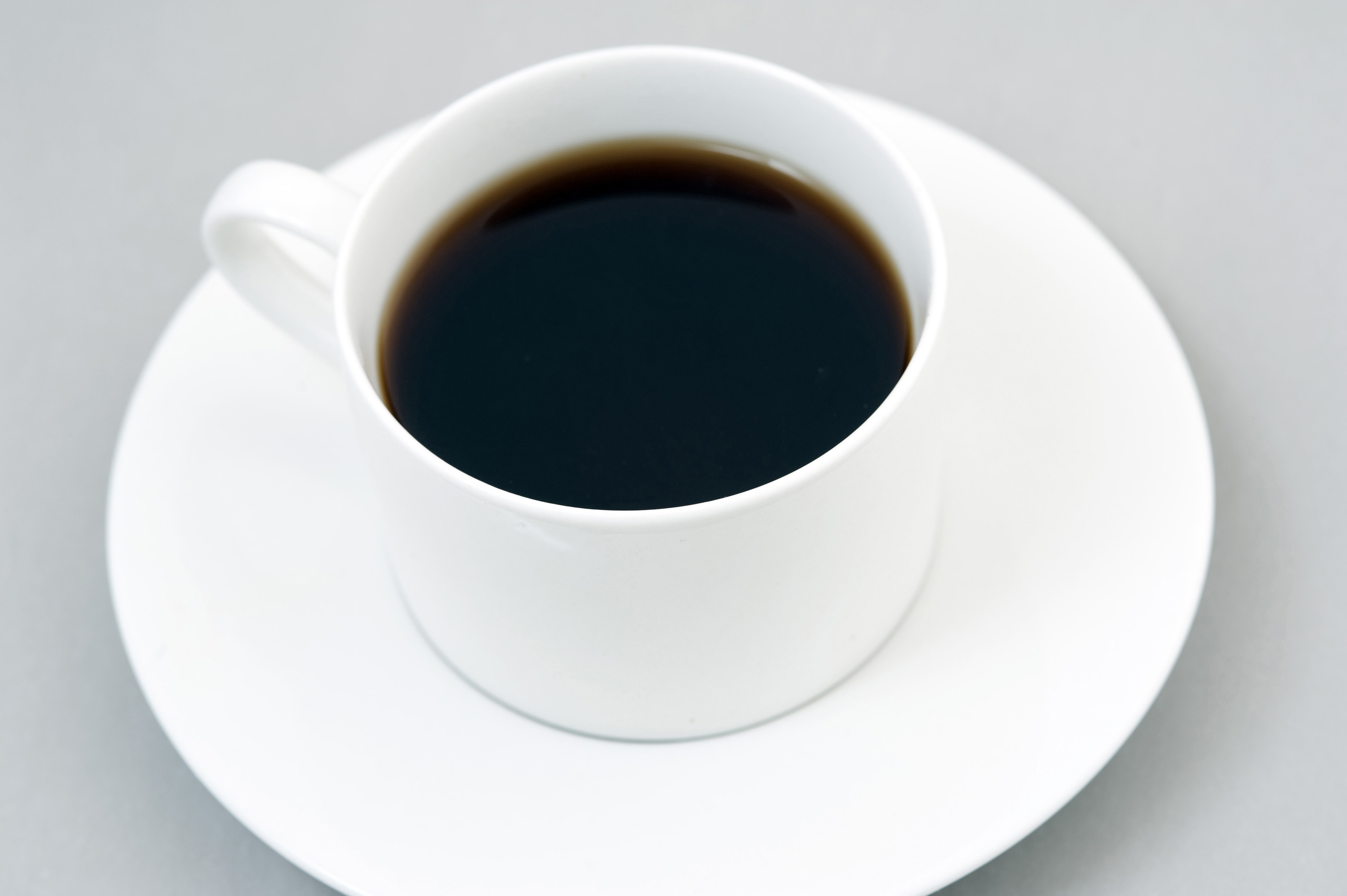 Free Stock Photo 11611 Cup of black coffee on saucer | freeimageslive