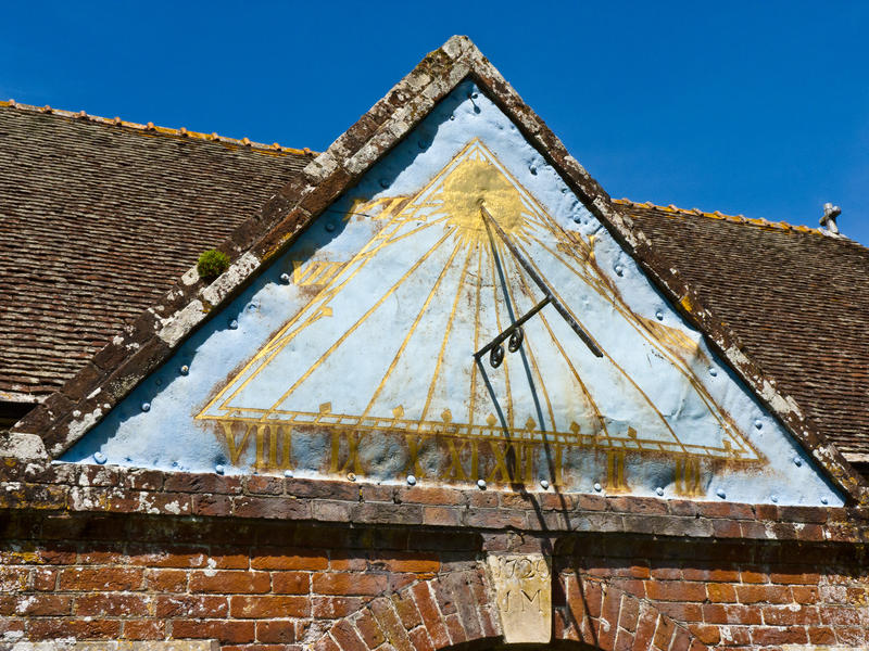 <p>Blue Sundial</p>The medieval Church of St.Mary at Ellingham has a 18th century porch on which this sundial is mounted.