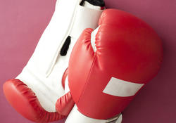 10979   Close up Boxing Gloves on Dark Pink Background
