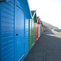 8060   Row of brightly coloured beach huts