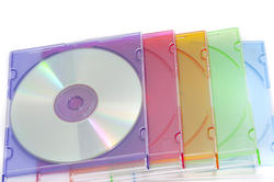 11095   Pile of Colorful CD Cases on White Background