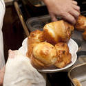 9950   Woman cooking Yorkshire Puddings