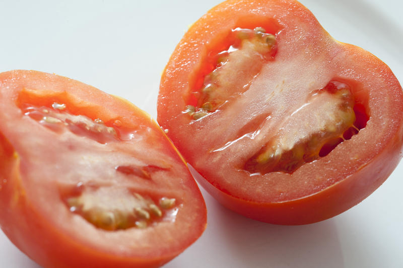 Close-up of fresh tomato divided in half