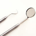 11543   Dental Pick and Mirror on White Background