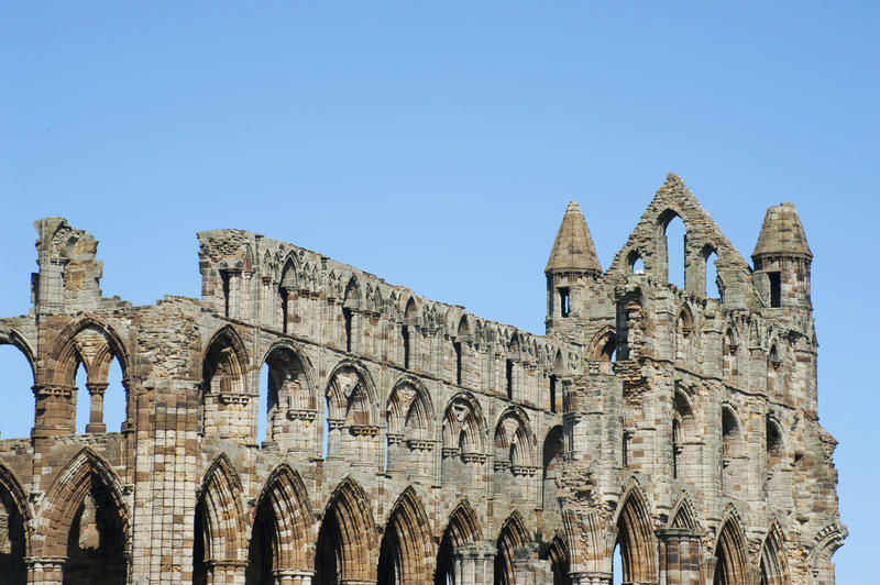 Whitby Abbey ruins detail showing the multiple stone arches of this medieval Benedictine monastery that was destroyed under King Henry VIII