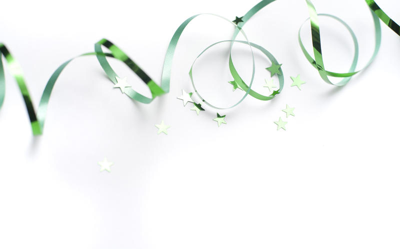 A green ribbon and stars background conceptual of ireland and saint patricks day