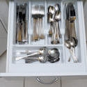 8142   Cutlery in an open kitchen drawer