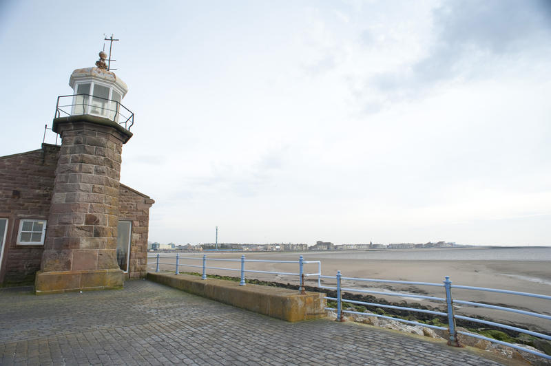 View of the Morecambe lighthouse overlooking the treacherous Morecambe sands and Morecambe Bay on the Lancashire coast