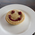 10488   Meat pie with a smiley gravy face