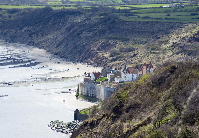 Scenic high angle view of the beach at Robin Hoods Bay, a small fishing village and a bay located within the North York Moors National Park,