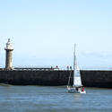 8026   j92 Yacht sailing past Whitby breakwaters