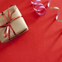 11423   Festive background with a small gift