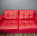 10665   Comfortable red upholstered leather sofa