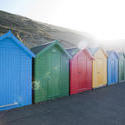 7843   Brightly coloured beach huts