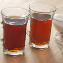 11642   Two mugs of hot sweet black tea
