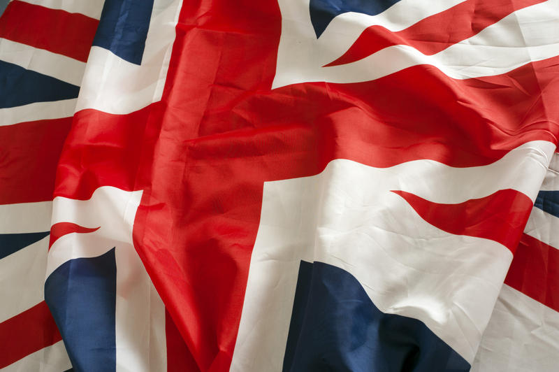 Union Jack flag patriotic background with a close up of the wrinkled folded centre of the flag of the United Kingdom