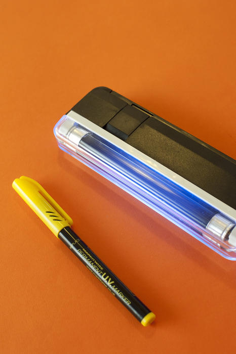 a uv readable marker pen and uv lamp for security marking personal property