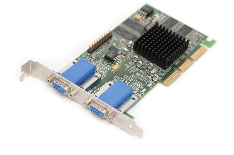 Close up Computer Video Card for Monitor Display with Black Heat Sink Isolated on a White Background