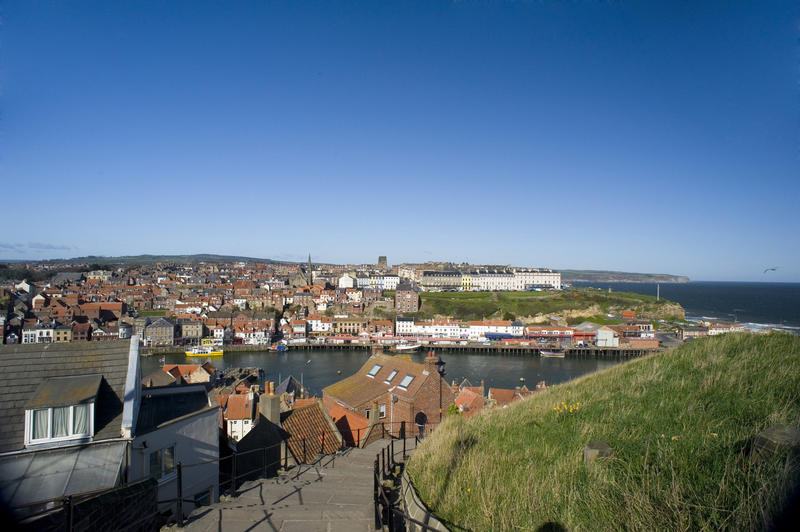 Church Stairs in Whitby with a view of houses in a landscape view