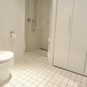 10667   Monochromatic white bathroom interior