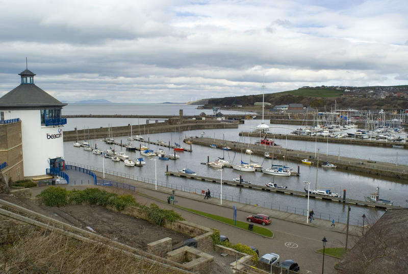 Scenic view of Whitehaven harbour with yachts and pleasure boats moored in front of the Beacon