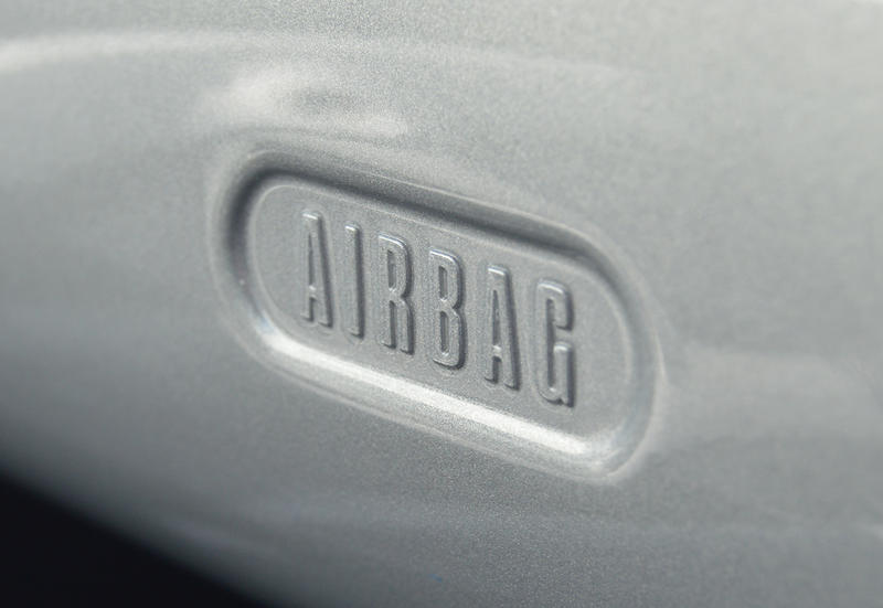 <p>Airbag sign or label in a BMW Mini One.</p>
Airbag sign or label in a BMW Mini One