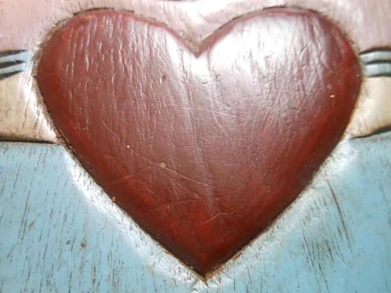 <p>shiny red wooden heart</p>
