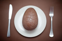 13447   chocolate Easter Egg on a plate