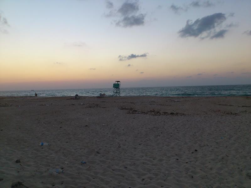 <p>A deserted beach at twilight</p>
