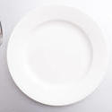 17143   Clean empty white dinner plate with cutlery