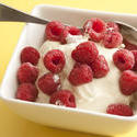 13007   Fresh raspberries on a bowl of plain yoghurt
