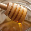 12334   Honey dipper coated in honey