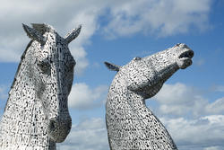 12855   The Kelpies, Falkirk, Scotland against a blue sky