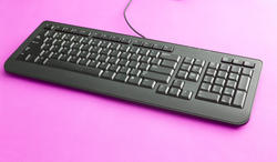 12712   Black computer keyboard on pink