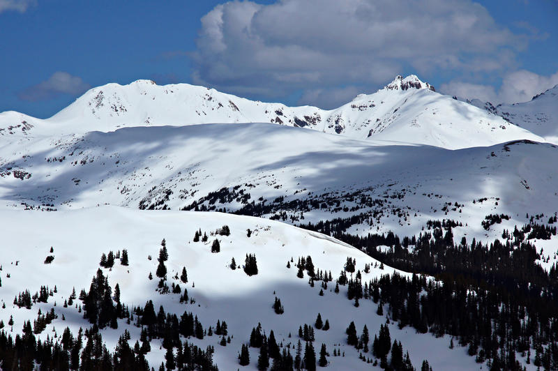 <p>Snowy mountain peaks and clouds can be seen on Colorado&#39;s Loveland Pass as it traverses the Continental Divide.</p>

<p><br />
<a href="http://pinterest.com/michaelkirsh/">http://pinterest.com/michaelkirsh/</a></p>

