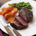 12298   Medium rare fillet steak with carrots and beans