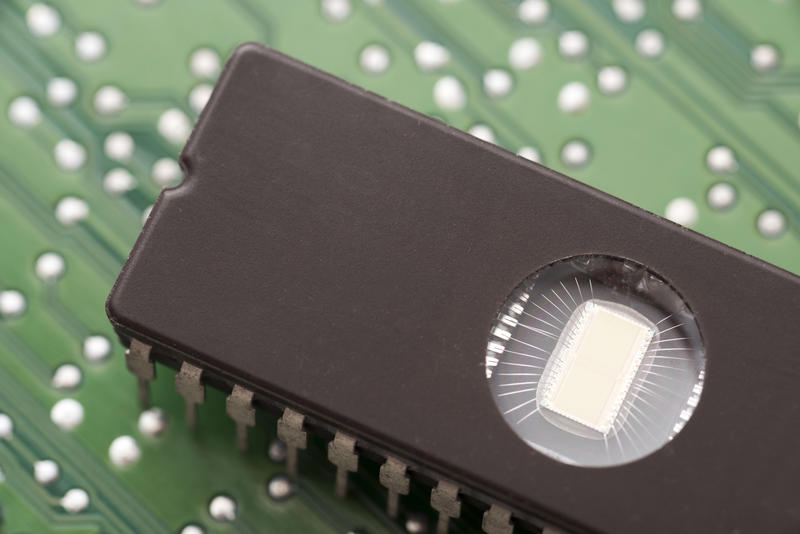 New integrated memory chip close-up on green board