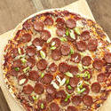 12762   Delicious salami Italian pizza