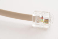 13715   Transparent plastic connector on a phone cable