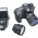 12191   Digital camera, lens and flash strobe