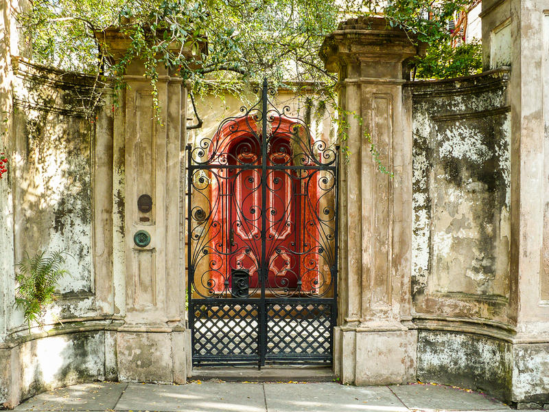 <p>Rasberry red entrance doors.</p>
