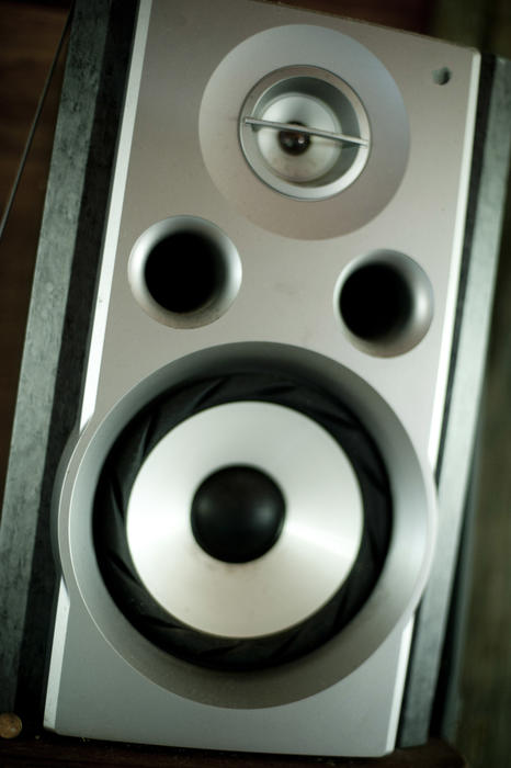 Speaker for a sound system or hi-fi in a close up tilted view of the front panel