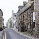 12866   Empty narrow street with old stone houses
