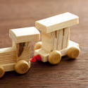 11986   Wooden Train and Caboose Car on Wood Surface