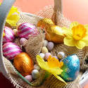 17331   Basket of easter eggs, decorated with daffodils