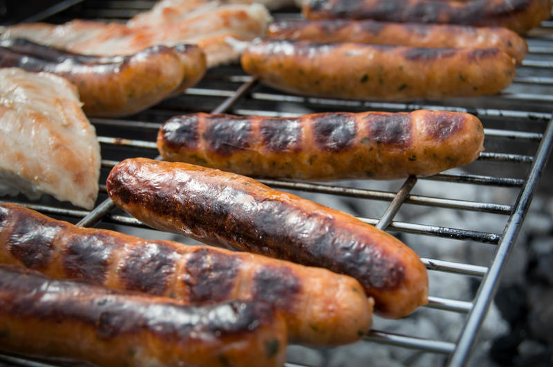 <p>BBQ grill with sausages</p>
BBQ grill